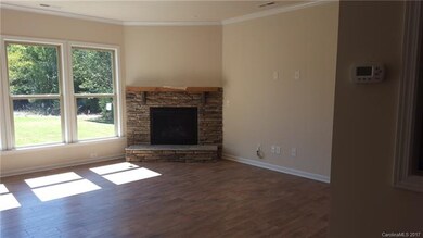 Example of Gathering with stone fireplace