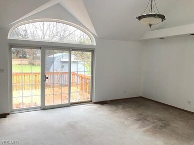 Dining room is open to living room and views of the spacious lot...
