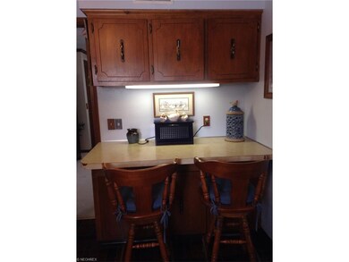 This kitchen wall faces the living room and could 