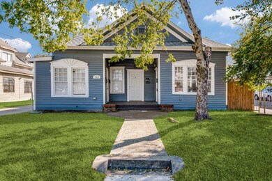 View of front of home featuring a shingled roof
