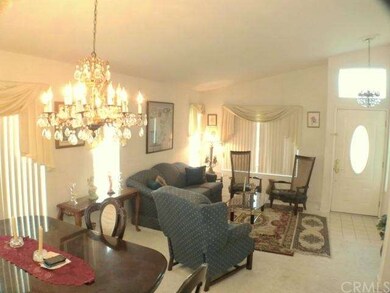 Bright formal living and dining rooms with custom 