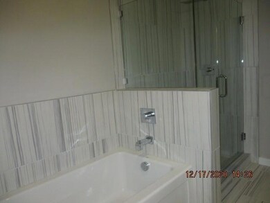 Check out this wonderful soaking tub & large showe