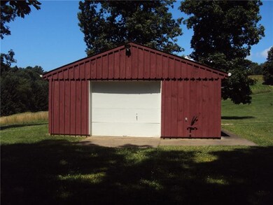 Outbuilding barn for parties or storage.