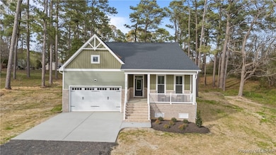 Craftsman inspired home featuring roof with shingl