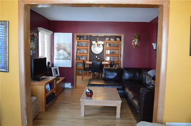 Living room/dining room view from office/den