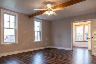 Living room, has view of potential office space