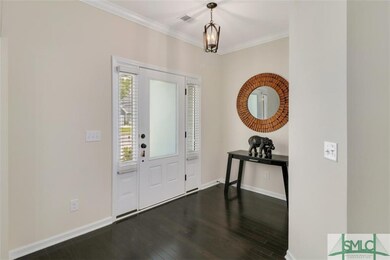 Upon entering this upgraded home you will be met w