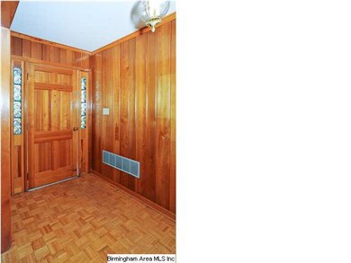 Rich Wood paneling in entry