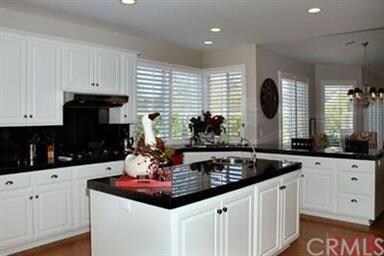 Gourmet kitchen with commercial grade appliances. 