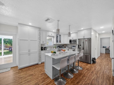 7026 Pine Tree Ln, West Palm Beach, FL 33406 - photo 4