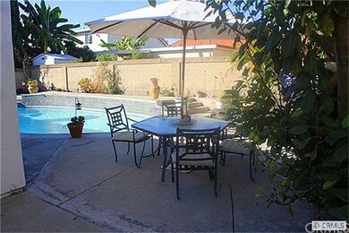 View of pool from side with MORE room to entertain and soak in the sun