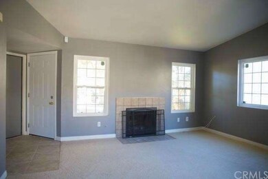 The Living Room with Fireplace.