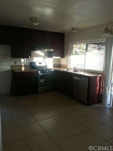 Kitchen with brand new stove, dish washer, hood an