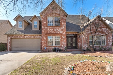 Traditional-style home with french doors, brick si