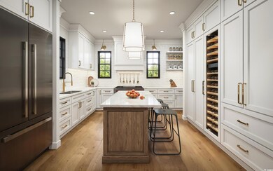 Kitchen with hanging light fixtures, stainless ste