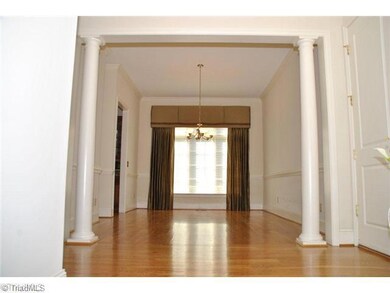 Dining Room. Great home to entertain in, see grand dining room area with beautiful hardwood floors and high ceilings.