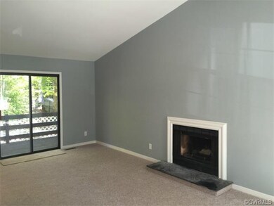 Huge family room with fireplace and lots of natura