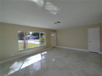 Living/Family Room w/ Impact Picture Window & Fron