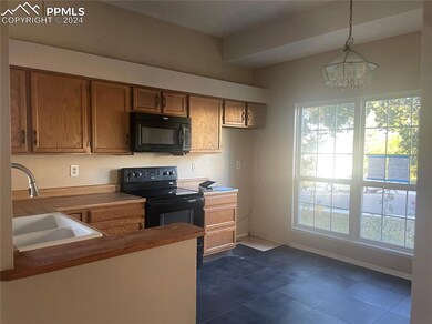 The kitchen has an area for a dining table