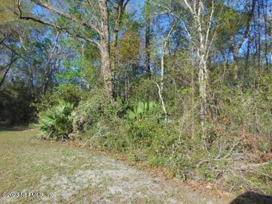 Wooded area to left