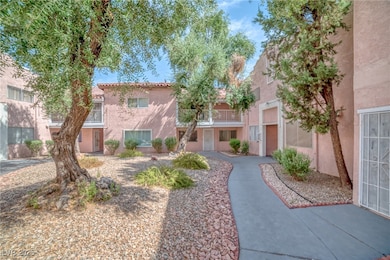 View of home's community with a balcony and stairs