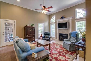 The Hearth room will be a favorite gathering spot for family and friends.  A gas fireplace for a cozy feel in the winter.  Access to the screened in porch, a great place to kick back with a good book