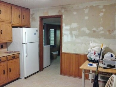 Lots of cabinets in the kitchen.