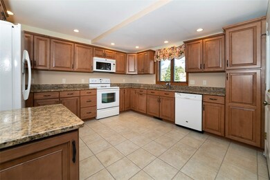 Spacious kitchen with granite counters