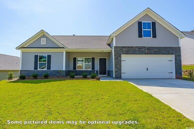 View of front of property featuring a front yard