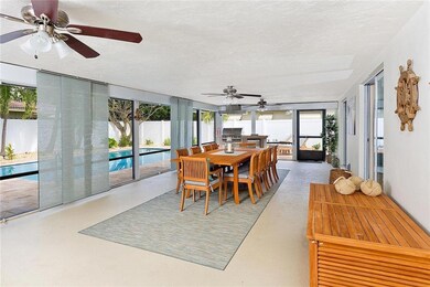 Large and spacious back patio is screened and offe