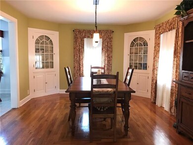 FORMAL DINING ROOM WITH BUILT - INS AND HARDWOOD F