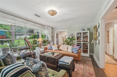 Living Room area features wood finished floors and baseboards