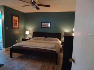 Master bedroom with private shower only bath.  Wal