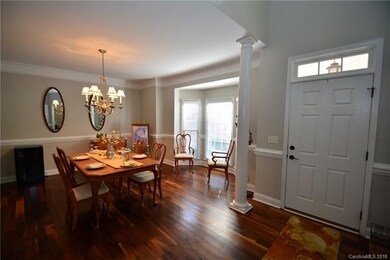 Large Dining Room with beautiful columns.  Upgrade
