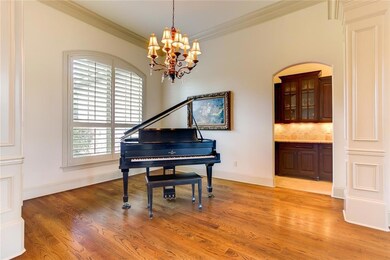 DINING ROOM WITH BEAUTIFUL MOLDING AND PLANTATION 