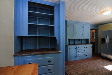 Butler's pantry with built-in shelving, drawers &