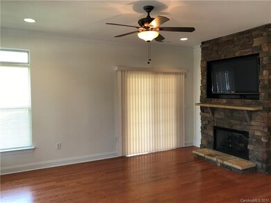 Living Room also has hardwood floor and a stacked 