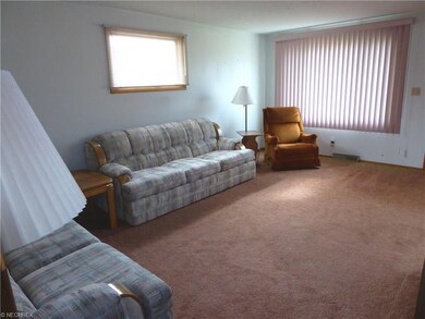 Living Room has a Large Picture Window ... You Wil