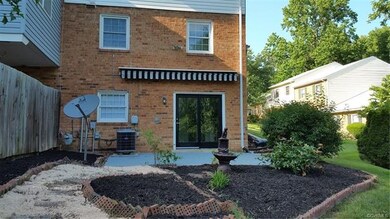 Backyard view of patio, electric awning with remot