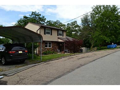 Exterior Front. COVERED PARKING