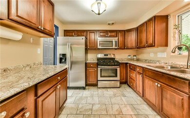 Newly remodeled kitchen featuring stainless applia