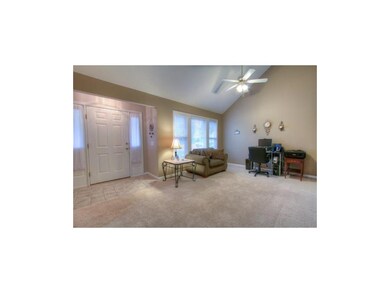 Living room with vaulted ceiling