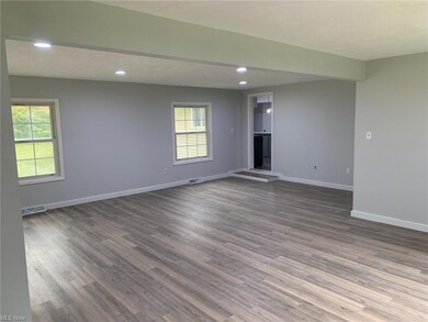 Unfurnished room featuring light hardwood floors