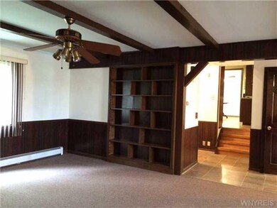 Family Room Built in Bookcases in FR  and leads to