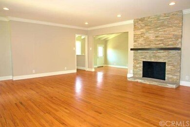 View of Living room towards kitchen and family roo