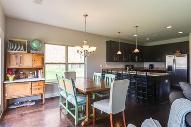 The combination kitchen and dining area is perfect for entertaining or enjoying a quiet evening at home.