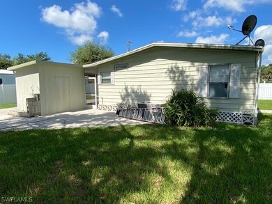 Back yard and additional patio. Picture taken facing east
