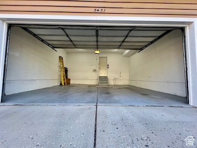 Big Garage featuring a garage door opener
