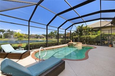 View of pool with a water view, a patio, a pool wi