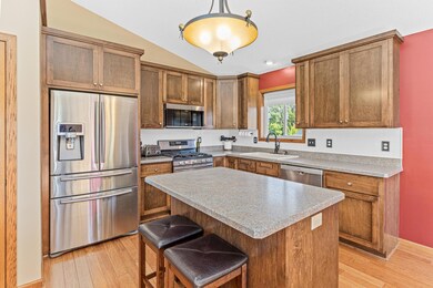 A convenient center island provides extra storage, seating and counter space